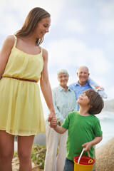 Wall Mural - Family, mom and kid holding hands on beach for vacation, adventure and tropical holiday in Australia. Grandparents, mother and happy face of boy child at ocean with love, weekend and smile in summer.