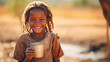 Poor, beggar, hungry dark-skinned child girl in Africa, thirsty to drink water.