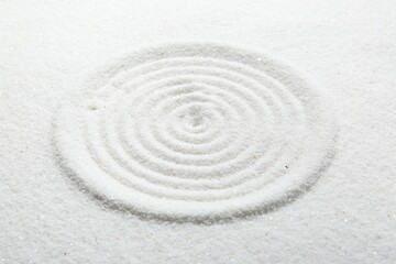 Wall Mural - Zen rock garden. Circle pattern on white sand