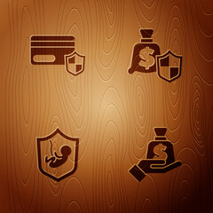 Wall Mural - Set Money in hand, Credit card with shield, Life insurance and on wooden background. Vector