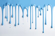 © SumpeK - Blue paint dripping on white background, 3d illustration of blue sky paint dripping on white wall.
