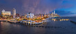 New York City, Little Island public park at twilight with view of the World Trade Center after a storm. Elevated park with amphitheater at Hudson River Park (Pier 55), West Village, Manhattan
