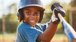 a young boy wearing a baseball helmet and holding a bat in his hand and smiling
