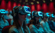 © Vadim - Young woman sitting in row of spectators in cinema wearing VR glasses and headphones.