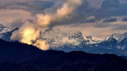 Wall Mural - Spectacular mountain range in the evening after a sunny day - beautiful colors - amazing drone photography