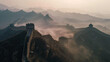 The Great Wall of China enveloped in morning mist, captured at sunrise, epitomizing endurance and history
