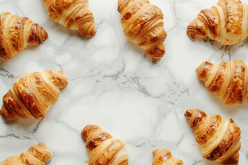 Wall Mural - croissants on a white background, overhead view