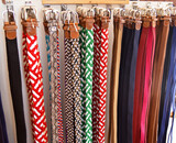 Fototapeta Tęcza - Colorful braided belts. Male belt. Ubrique crafts. Display stand with belts in a store in Ubrique, fashion from Spain
