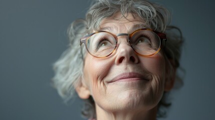 Poster - Woman with glasses looking up at the sky, perfect for science or astronomy concepts
