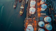 © S photographer - Aerial view of oil storage tanks, oil refinery at oil depot, transportation of fuel energy by tanker.