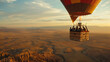 A hot air balloon gracefully glides over a beautiful landscape