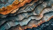 Rugged textured landscape showcasing colorful stratified rock layers