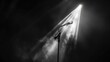 © Artyom - Dramatic black and white image of a lone microphone under a spotlight on an empty stage