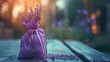 fragrant bag with lavender on a wooden background