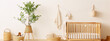 Cute nursery room with a wooden crib and a plant in a basket