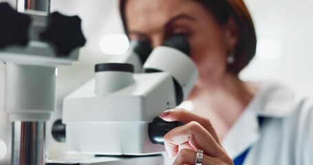 Aufkleber - Woman, scientist and forensic research with microscope for science, microbiology or discovery at laboratory. Closeup of person or researcher looking in scope or lens for scientific breakthrough test