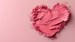 cream blush swatch in the shape of a heart on light pink background, copy space, space for text