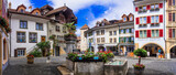 Fototapeta Na drzwi - Charming medieval towns and vilages of Switzerland - old town of Murten with floral streets, canton Fribourg