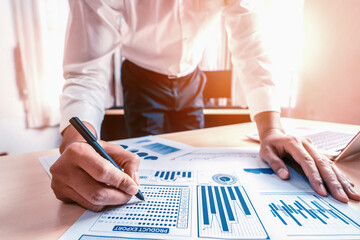 Poster - businessman accountant or financial expert analyze business report graph and finance chart at corpor