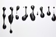 © sam - a group of black liquid drops