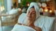 a pretty lady Enjoying Professional Wellness Massage In Spa Salon, with peaceful mind and closed eyes 