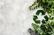 © Melanthe - Eco recycling sign with green leaves and plants on light background. Environmental problems and protection. World environment, Mother Earth day. Waste reuse concept. Caring for nature and ecology