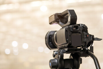 Video camera with blur background for journalist interview broadcasting reporter news or press conference speaker or public speaking or meeting report record and content creator live media concepts.