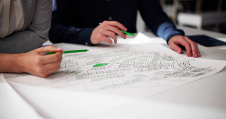 Poster - Close-up Of Human Hand Holding Pencil Over Paper Cadastre