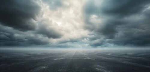 Horizon with Dramatic Clouds and Empty Dark Asphalt