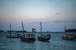 Vintage boats docked in Abu Dhabi at twilight