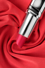 Poster - Lipstick on red fabric