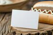 Unconventional Composition: Macro Shot Capturing Realistic Details of a Business Card and Hotdog