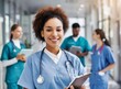 © D'Arcangelo Stock - Latin female doctor working at hospital with healthcare teamwork.