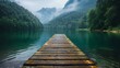 © Meow Creations - Wooden pier on beautiful alpine lake in misty morning.