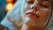 A woman having a facial mask in a spa treatment