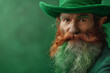 A man with a long beard wearing a green hat, symbolizing St. Patrick's Day celebrations, copy space