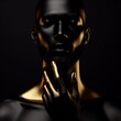 Man with golden skin on black background 