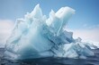 Iceberg calving caught mid-motion, splinters of ice scattering
