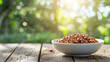 white bowl with beans on a wooden background