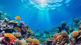 Fototapeta Do akwarium - Underwater coral reef landscape wide panorama background  in the deep blue ocean with colorful fish and marine life