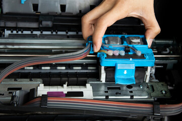 Poster - technician repairing printer, fixing printer head