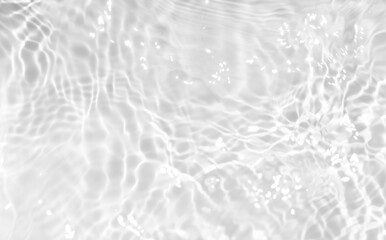  White water surface texture with ripples, splashes, and bubbles. Abstract summer banner background Water waves in sunlight with copy space cosmetic moisturizer micellar toner emulsion. White water.