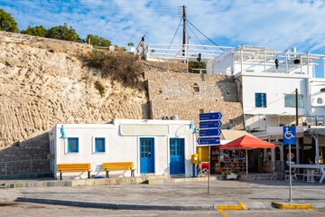 Wall Mural - Traditional buildings in Adamas port, Milos island, Cyclades, Greece