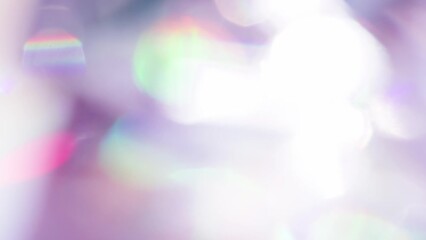 Wall Mural - Delicate Purple Tints of jewels. Loop. The light passes through the facets of a slowly rotating diamond and creates repetitive sparkling highlights and rainbow colors