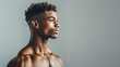 © Ratthamond - Handsome African man with good figure looking away, advertisement, copy space, concept for health and self-care
