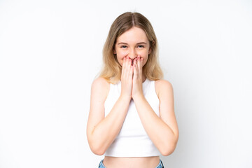 Wall Mural - Blonde English young girl isolated on white background happy and smiling covering mouth with hands