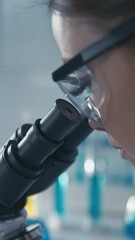 Fototapete - In the laboratory, a molecular biologist studies the structure and function of biomolecules to understand life processes. An experimental geneticist conducts genetic research to study the hereditary