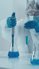 Poster - In the laboratory, a medical researcher conducts experiments with cells to find new treatments for cancer. A scientist studies the properties of new medical materials in the laboratory in order to use