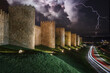 walls of Avila, with a storm approaching.