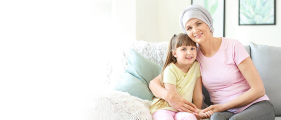 Wall Mural - Mature woman after chemotherapy with her granddaughter at home